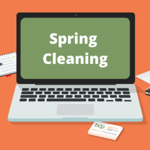 laptop graphic with "spring cleaning" on the screen